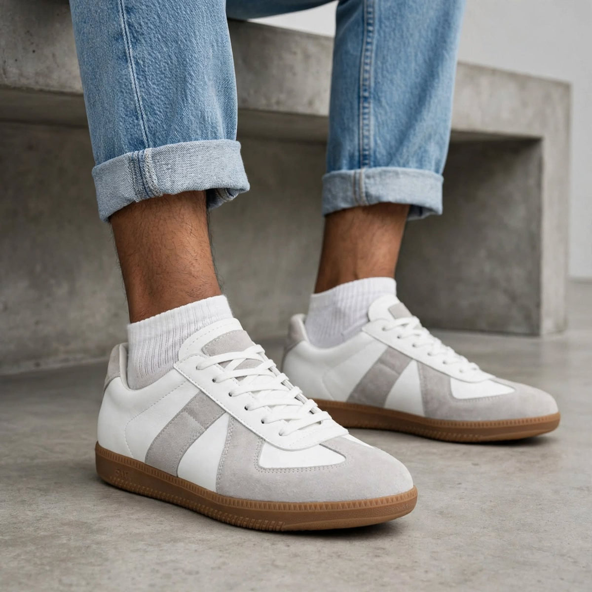 Men's White Grey German Sneakers On-Foot Lifestyle Shot with Rolled Jeans – Premium Casual Footwear India
